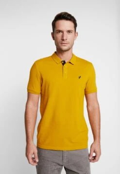 Pier One Poloskjorter - Mustard